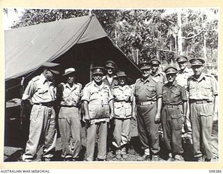 RABAUL, NEW BRITAIN. 1945-10-27. GENERAL SIR THOMAS A. BLAMEY, COMMANDER-IN-CHIEF, ALLIED LAND FORCES, SOUTH WEST PACIFIC AREA, WITH STAFF MEMBERS OF 118 GENERAL HOSPITAL DURING HIS VISIT TO THE ..