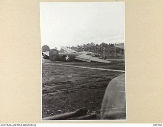 MILNE BAY, NEW GUINEA. 1942-08-22. A CRASHED LIBERATOR AIRCRAFT AT NO. 1 AIRSTRIP