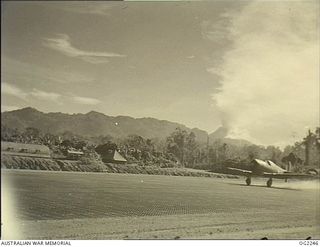 TOROKINA, BOUGAINVILLE ISLAND, SOLOMON ISLANDS. C. 1945-02. AN AUSTRALIAN BUILT BOOMERANG AIRCRAFT OF NO. 5 (TACTICAL RECONNAISSANCE) SQUADRON RAAF RACES DOWN THE PIVA AIRSTRIP ON TAKE-OFF TO ..