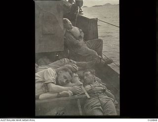 AT SEA BETWEEN GOODENOUGH ISLAND AND THE TROBRIAND ISLANDS, PAPUA. 1943-11-27. ON BOARD SS HANYANG DURING THE MOVE OF NOS. 22 AND 30 SQUADRONS RAAF FROM GOODENOUGH ISLAND TO KIRIWINA THESE THREE ..