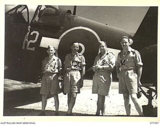 OFFICERS OF THE ROYAL NEW ZEALAND AIR FORCE NEAR ONE OF NO. 16 SQUADRON CHANCE-VOUGHT "CORSAIR" AIRCRAFT. IDENTIFIED PERSONNEL ARE:- FLIGHT LIEUTENANT R. DEVIN (1); NZ638064 FLYING OFFICER T.W. ..