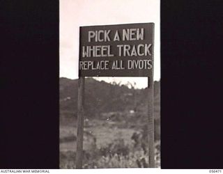 REINHOLD HIGHWAY, NEW GUINEA, 1943-08-24. TYPE OF SIGN PLACED ALONG THE ROAD TO IMPRESS THE DRIVERS OF THE NEED FOR CAUTION