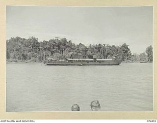 LABU, NEW GUINEA. 1944-10-03. THE "FRANCES PEAT" A COMPARATIVELY SMALL VESSEL WHICH WAS IN USE FOR SOME YEARS BEFORE THE WAR AS A VEHICULAR FERRY ON THE HAWKESBURY RIVER