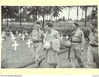 MILNE BAY, NEW GUINEA. 1944-04-20. THE HONOURABLE E.J. WARD, MINISTER FOR EXTERNAL TERRITORIES IN THE AUSTRALIAN GOVERNMENT (2), WITH MEMBERS OF HIS OFFICIAL PARTY VISITING THE AUSTRALIAN WAR ..