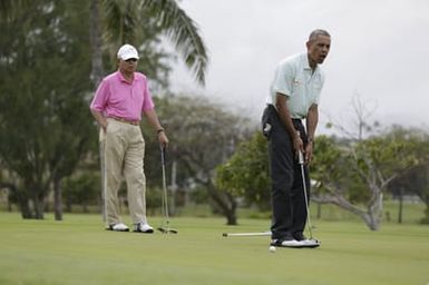 Barack Obama plays golf with Prime Minister Najib Razak, Joe Paulsen, and Mike Brush in Kaneohe Bay, Hawaii, December 24, 2014