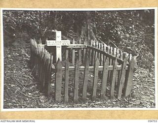 BULLDOG ROAD, NEW GUINEA, 1943-07-18. GRAVE OF NX592 LANCE CORPORAL W. AYTOUN OF THE ROYAL AUSTRALIAN ENGINEERS WHOS WAS KILLED IN A LANDSLIDE AT FOX'S GAP 1943-05-19