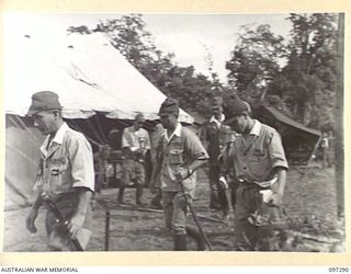 BUIN AREA, BOUGAINVILLE. 1945-09-13. JAPANESE STAFF OFFICERS DEPARTING FROM A CONFERENCE WITH MEMBERS OF THE AUSTRALIAN SURRENDER PARTY FROM HEADQUARTERS 2 CORPS HELD AT KAHILI BEACH. THE ..