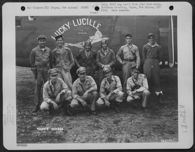 Lt. Kimbrough And Crew Of The 65Th Bomb Squadron, 43Rd Bomb Group, Pose Beside The Consolidated B-24 'Lucky Lucille' At Dobodura Airstrip, Papua, New Guinea. 2 March 1944. (U.S. Air Force Number 72370AC)