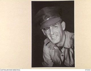 LAE, NEW GUINEA. 1944-05-20. NX190300 WARRANT OFFICER 1, D CRAWLEY, ROYAL PAPUAN CONSTABULARY, (EUROPEAN SECTION). FORMERLY THE BANDMASTER OF THE NEW GUINEA POLICE FORCE, HE IS THE FOUNDER AND ..