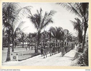 WUNUNG, JACQUINOT BAY, NEW BRITAIN, 1945-08-28. A FULL PARADE OF 37/52 INFANTRY BATTALION AND 29/46 INFANTRY BATTALION, BOTH OF 4 BRIGADE, WAS HELD ON WUNUNG AIRSTRIP. THIS PARADE WAS TO PREPARE ..