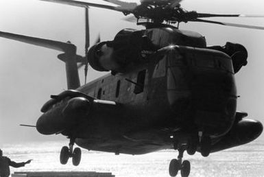 A CH-53 Sea Stallion helicopter takes off from the flight deck of the amphibious assault ship USS GUAM (LPH 9), during operations off the coast of Beirut, Lebanon