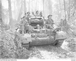 BOUGAINVILLE. 1945-05-22. MATILDA TANKS OF B SQUADRON, 2/4 ARMOURED REGIMENT, MOVING ALONG THE BUIN ROAD SOUTH OF THE HONGORAI RIVER TO C COMPANY, 24 INFANTRY BATTALION POSITION ON EGAN'S RIDGE ..