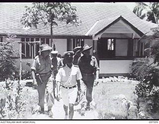 OCEAN ISLAND. 1945-09-30. LIEUTENANT COLONEL J. L. A. KELLY, MILITARY GOVERNOR OF NAURU AND OCEAN ISLANDS AND COMMANDER AUSTRALIAN GARRISON AND MAJOR G. D. CLARKSON, LIAISON OFFICER, LEAVING THE ..
