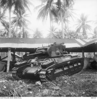 SATTELBERG, NEW GUINEA. 1944-07-06. A TANK OF THE 4TH ARMOURED BRIGADE GROUP. THE PHOTOGRAPH WAS TAKEN FOR USE BY VX76415 LIEUTENANT R.B. EWERS, OFFICIAL WAR ARTIST, MILITARY HISTORY SECTION