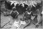 Pig festival, pig sacrifice, Tsembaga: ritual exchange of shell valuables, steel axes, and other wealth displayed on mat