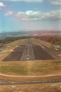 Looking east, this is the final approach to the 9,000 foot runway at Dillingham Air Field on the northwest corner of the island. This former Air Force fighter base is now used by the Air Force parachute team and flying club as a training site. The field is available to all services as a subsidiary emergency landing site