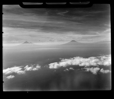 Mt Ulawun (Father), 7376 feet high, and Mt Bamus (South Son), 7546 feet high, New Britain, Papua New Guinea