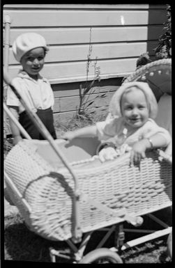 Margaret Hare as an infant, with a young boy