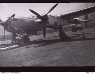 NADZAB, MARKHAM VALLEY, NEW GUINEA. 1944-03. UNIT NO 1 WIRELESS UNIT RAAF WORKING WITH THE UNITED STATES 5TH AIR FORCE. THE P38 (LIGHTNING) FIGHTER AIRCRAFT FLOWN BY MAJOR RICHARD I. BONG OF THE ..