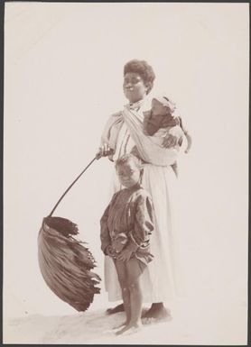 Mother with two children on the beach at Rowa, Banks Islands, 1906 / J.W. Beattie