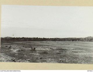 PORT MORESBY AREA. 1943-09-14. JACKSON'S AIRFIELD FROM WHICH A LIBERATOR TAKING OFF IN DARKNESS ON THE MORNING OF THE 09-07, AND FLYING VERY LOW, STRUCK A TREE AND CRASHED INTO TRUCKS CARRYING ..