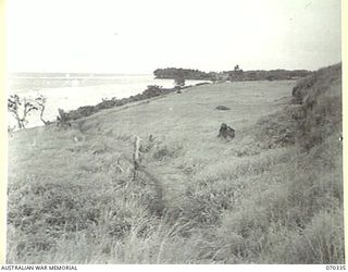 SIO MISSION, NEW GUINEA, 1944-02. VIEW OF THE COAST FROM SIO MISSION TOWARDS TELIATA POINT. THIS IS AN OPERATIONAL AREA OF THE 2/17TH INFANTRY BATTALION