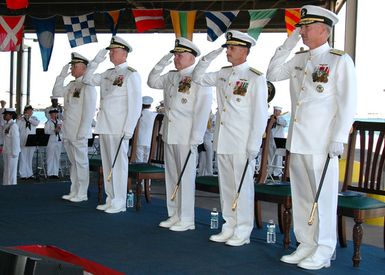 060808-N-4965F-008 (Aug, 8, 2006)(From right-to-left), US Navy (USN) Rear Adm. Townsend G. Alexander, Commander Navy Region Hawaii, and Commander, Naval Surface oup Middle Pacific, USN Rear Adm. Michael C. Vitale, Commander, Theodore Roosevelt Strike oup, USN Vice Adm. Robert T. Conway, Commander, Navy Installations Command, USN Adm. Gary Roughed, Commander, US Pacific Fleet and USN CAPT. Gene Theriot, Chaplain for Navy Region Hawaii, render honors during the parading of the Colors at an official Change of Command (COC) ceremony on board Naval Station (NS) Pearl Harbor. Rear Adm. Vitale was relieved by Rear Adm. Alexander as Commander, Navy Region Hawaii and Commander, Naval Surface...