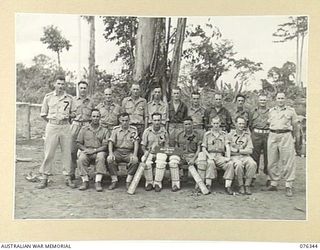 LAE, NEW GUINEA. 1944-10-01. MEMBERS OF THE CRICKET TEAM OF THE 22ND WORKS COMPANY. IDENTIFIED PERSONNEL ARE:- N390772 PRIVATE G.R. MARTIN (1); NX192116 PRIVATE G. ETCHES (2); N451891 PRIVATE J. ..