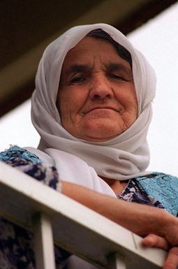 A Kurdish woman relaxes outside a family housing complex used as her temporary lodging at Andersen Air Force Base, Guam, during Operation PACIFIC HAVEN. The operation, a joint humanitarian effort conducted by the US military, entails the evacuation of over 2,400 Kurds from northern Iraq to avoid retaliation from Iraq for working with the US government and international humanitarian agencies. The Kurds will be housed at Andersen AFB, while they go through the immigration process for residence in the United States