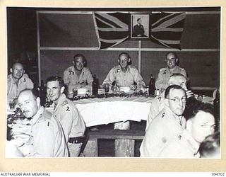 LAE AREA, NEW GUINEA. 1945-08-07. OFFICERS ATTENDING A DINNER AT 112 CONVALESCENT DEPOT HELD IN HONOUR OF LIEUTENANT COLONEL D.F. MILLAR, COMMANDING OFFICER, 112 CONVALESCENT DEPOT (6) WHO IS ..