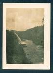 View of spillway from the fluming into the Bulolo River for the Bulolo Gold Dredging mine hydro-scheme, Bulolo, New Guinea, c1932 to 1933