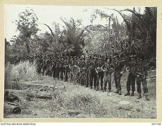 Personnel of the Fighting Patrol from C Company, 2/1 Infantry Battalion. Identified: unidentified Artillery Signaller, 2/2 Field Regiment (1); unidentified Artillery Signaller, 2/2 Field Regiment ..