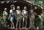 Young boys in front of men's area shelter