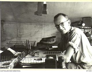 KILIGIA, NEW GUINEA, 1944-03-16. QX35735 LIEUTENANT COLONEL L.V.M. JENSEN, CO, HEADQUARTERS, 5TH DIVISION SIGNALS SECTION