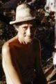 French Polynesia, portrait of elderly man wearing hat on Tahiti Island