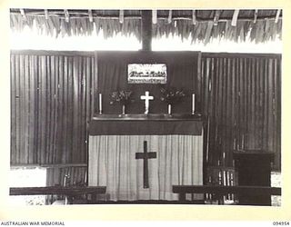 LAE AREA, NEW GUINEA. 1945-08-13. THE ALTAR OF THE MINIATURE CHAPEL, USED FOR COMMUNION SERVICE, 2/7 GENERAL HOSPITAL