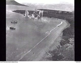 HANSA BAY, NEW GUINEA. 1943-08-28. THIRD OF A SERIES OF FIVE GRAPHIC PHOTOGRAPHS TAKEN FROM A RAAF PLANE DURING THE BOMBING OF A JAPANESE SUPPLY CRAFT, ILLUSTRATING THE CONSEQUENCES OF FOLLOWING A ..