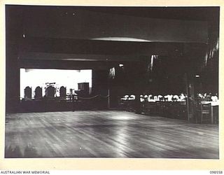 LAE, NEW GUINEA. 1945-10-22. THE OFFICERS' CLUB AT HEADQUARTERS AUSTRALIAN ARMY CANTEENS SERVICE