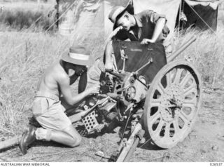 PAPUA, NEW GUINEA. 1942-09-07. A JAPANESE TYPE 94, 37 MILLIMETRE ANTI-TANK GUN, CAPTURED AT MILNE BAY, WHICH WEIGHS APPROXIMATELY 800 POUNDS AND FIRES ARMOUR-PIERCING AND HIGH-EXPLOSIVE SHELLS. IT ..
