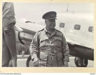 AITAPE, NEW GUINEA. 1944-11-29. GENERAL SIR THOMAS A BLAMEY, COMMANDER- IN- CHIEF, ALLIED LAND FORCES, SOUTH WEST PACIFIC AREA, (1), MOVING TO HIS CAR AT TADJI AIRSTRIP DURING A TOUR OF HQ 6 ..