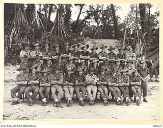 NCOs and other ranks comprising stretcher bearers, batmen, wagon orderlies and general duties staff in the officers' lines at HQ 17 Field Ambulance. Left to right (front row) VX134655 Private (Pte) ..