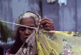 Native woman doing laundry, Rongelap Island, August 24, 1964