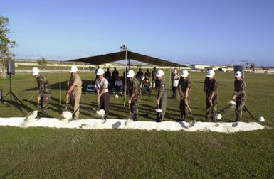 A ground breaking ceremony marks the beginning of construction for a new Security Forces Squadron operational building at Andersen Air Force Base (AFB), Guam. Breaking ground are (left to right): US Air Force (USAF) olonel (OL) Joseph F. Mudd Jr., ommander, 36th Air Base Wing; US Navy (USN) aptain (APT) Joseph D. Ludovici, Navy Officer in charge of onstruction ontracts; Mr. James Ramirez, Dick Pacific onstruction ompany, Ltd., Representative and SENIOR Vice-President; USAF OL Thomas P. Finnegan, 36th Air Base Wing; USAF OL Simpson, 36th Mission Support Group; USAF Major (MAJ) John Worley; USAF hief MASTER Sergeant (MSGT) Paul Steele, 36th Security Forces; and USAF Lieutenant...