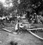 Cart-building workshop. Ilaisa Mini's place. (Sione Teu seated, Ilaisa right).