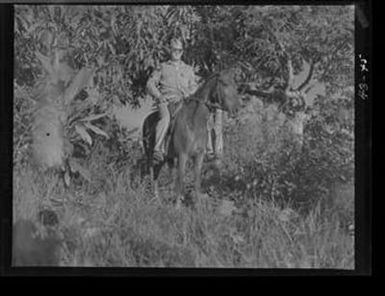 [Negative of a Soldier Emerging Form Trees on Horseback, #1]