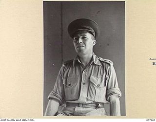 LAE, NEW GUINEA. 1945-10-04. LIEUTENANT COLONEL A.P. BENNETT, ASSISTANT QUARTERMASTER GENERAL MAINTENANCE, HEADQUARTERS FIRST ARMY