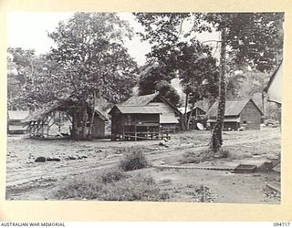 YALU AREA, NEW GUINEA, 1945-07-30. THE CAMP AREA, HEADQUARTERS 2/1 FORESTRY COMPANY, ROYAL AUSTRALIAN ENGINEERS, PHOTOGRAPHED AT THE COMMANDING OFFICER'S REQUEST FOR A REPORT