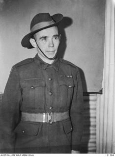 ROYAL PARK CAMP, VIC. 1946-09-06. QX20656 PRIVATE RICHARD KELLIHER VC, 2/25TH BATTALION, AIF. PRIVATE KELLIHER WAS AWARDED THE VICTORIA CROSS FOR BRAVERY AT HEATH PLANTATION NEAR LAE, NEW GUINEA, ..