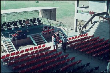 Ready for the ceremony, waiting for the audience, first graduation ceremony for the new University of Papua New Guinea, held in conjunction with the ANZAAS Congress : University of Papua New Guinea, Port Moresby, 1970 / Terence and Margaret Spencer