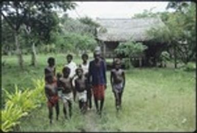 Group portrait of man and boys